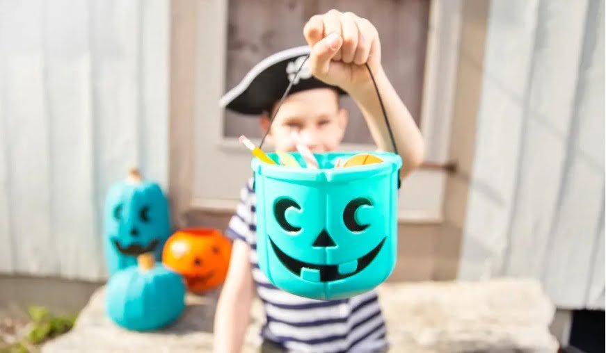 Teal pumpkin bucket in Halloween