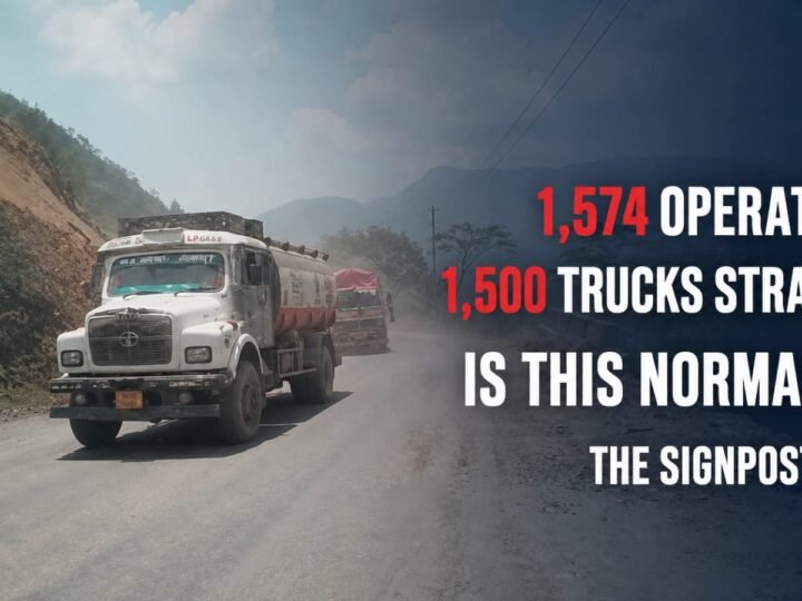 Goods trucks travelling along NH-37 in Manipur amid concerns over security escorts, prolonged congestion and the restoration of normalcy.